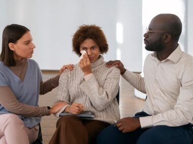 A mental health nurse comforting a mental health patient and creating mental health awareness