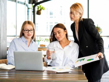 cooperate women discussing about long ter insurance