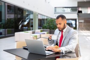 a business man reading up how to get business insurance