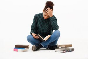 a student studying about student mental health